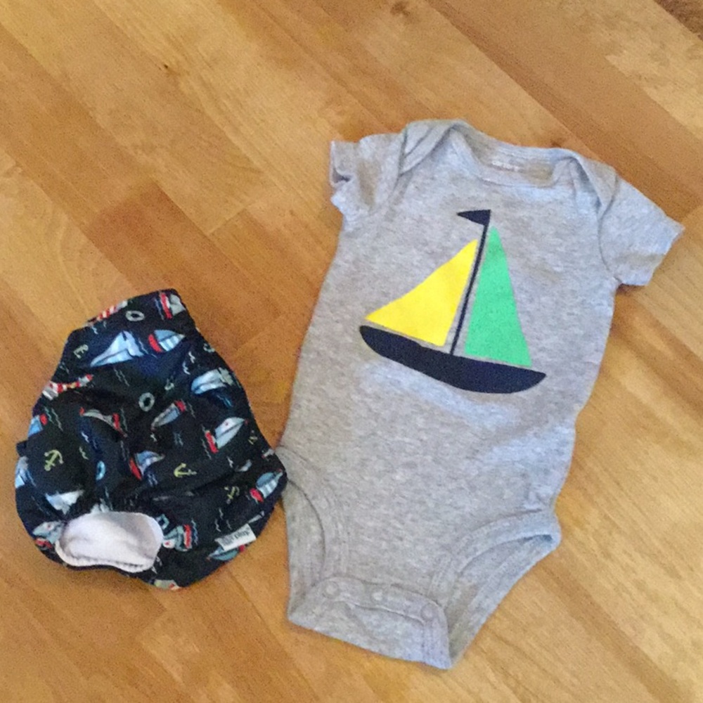 Swim diaper size 6M (runs Sm) onesie size 3M